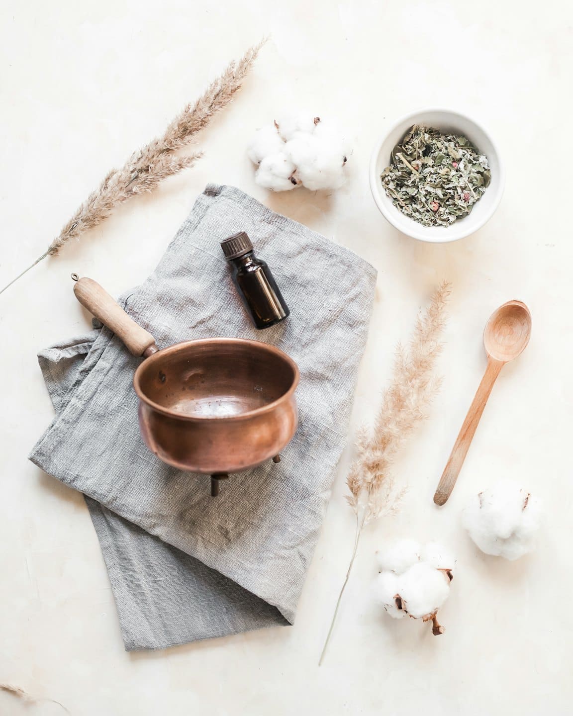Wellness products arranged on a textured off-white surface.